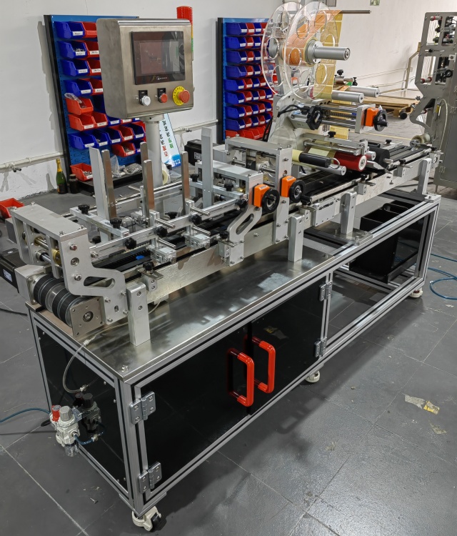 Coffee bag labeling machine